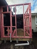 Exterior extension under construction — framework before roof installation